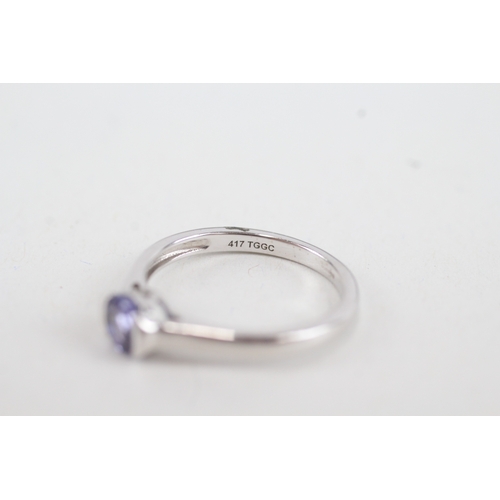 52 - 10ct white gold round tanzanite single stone ring (2g) Size  L  1/2