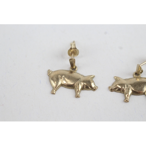 67 - 9ct gold piggy drop earrings (0.5g)