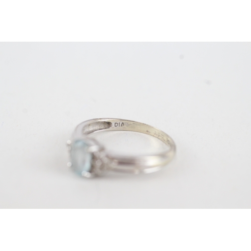 68 - 9ct white gold diamond & topaz trefoil ring (2g) Size  N 1/2