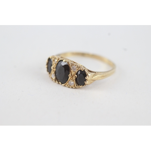 72 - 9ct gold diamond & sapphire seven stone ring (2.5g) Size  O 1/2