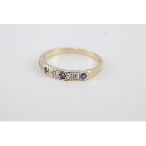 73 - 9ct gold diamond & sapphire seven stone ring (1.7g) Size  P