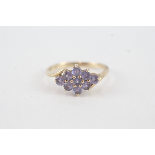 76 - 9ct gold tanzanite lozenge shaped cluster ring (2.9g)