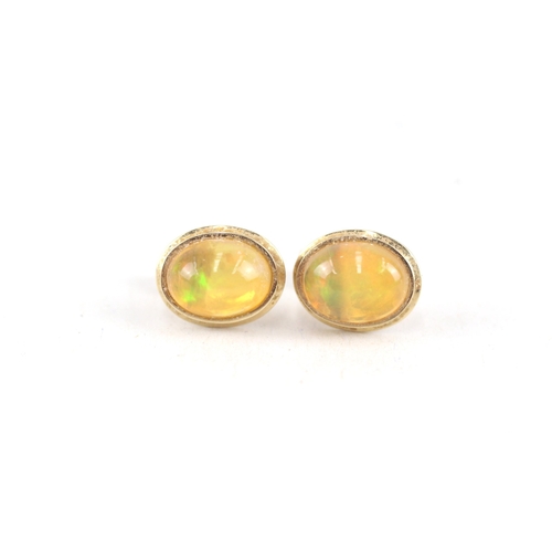 79 - 9ct gold oval opal cabochon stud earrings (1.7g)