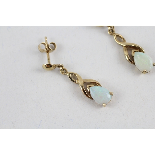 82 - 9ct gold opal drop earrings (1.8g)