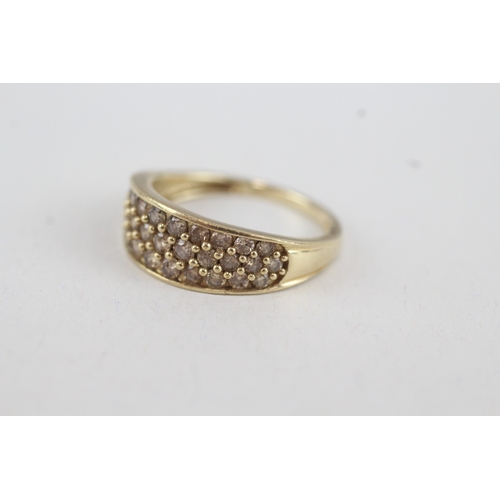 83 - 9ct gold diamond three row dome ring (2.9g) Size  N 1/2