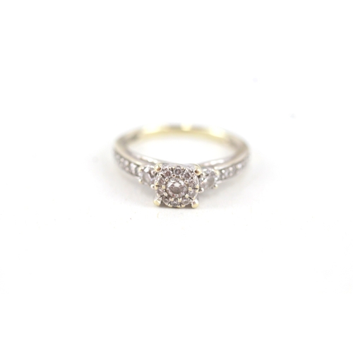 95 - 9ct white gold diamond halo ring with diamond set shoulders (2.2g) Size  R