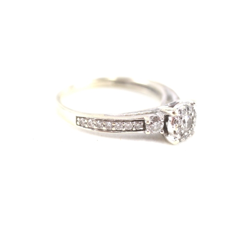 95 - 9ct white gold diamond halo ring with diamond set shoulders (2.2g) Size  R