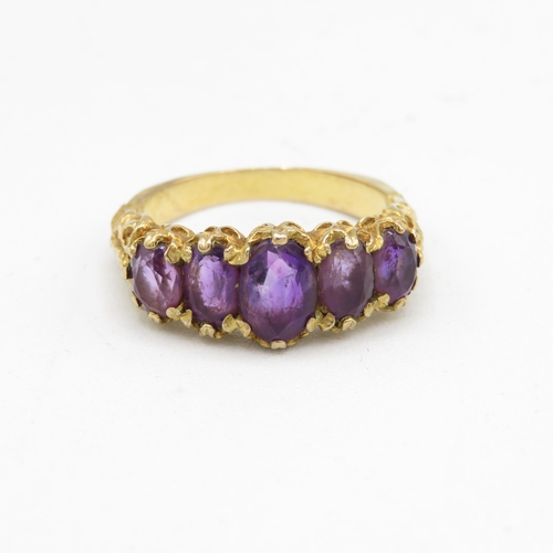 110 - 9ct gold vintage amethyst five stone ring with a patterned shank (3.7g) Size  N