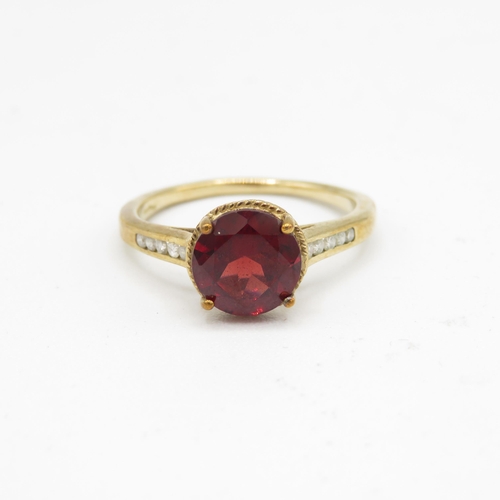 116 - 9ct gold garnet dress ring with diamond shoulders (2.6g) Size  N 1/2