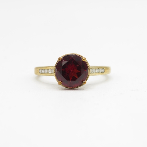 116 - 9ct gold garnet dress ring with diamond shoulders (2.6g) Size  N 1/2