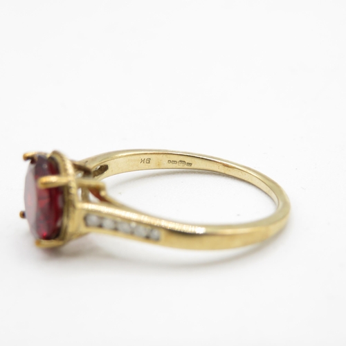 116 - 9ct gold garnet dress ring with diamond shoulders (2.6g) Size  N 1/2