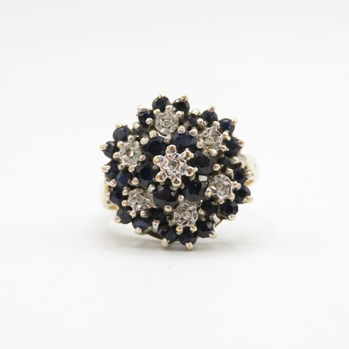 133 - 9ct gold diamond & sapphire floral cluster cocktail ring (4.4g) Size  O 1/2