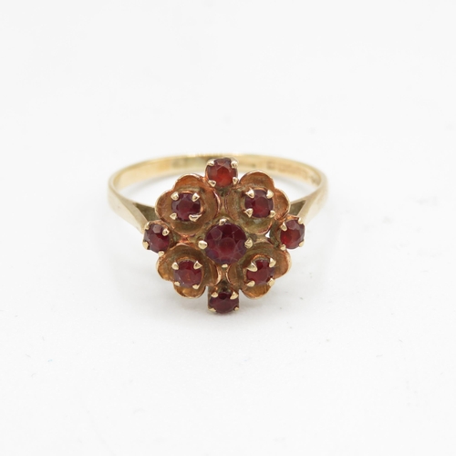 134 - 9ct gold garnet floral cluster ring (2.2g) Size  P 1/2