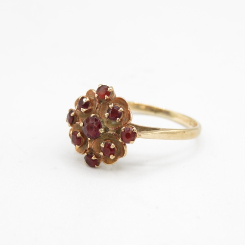 134 - 9ct gold garnet floral cluster ring (2.2g) Size  P 1/2