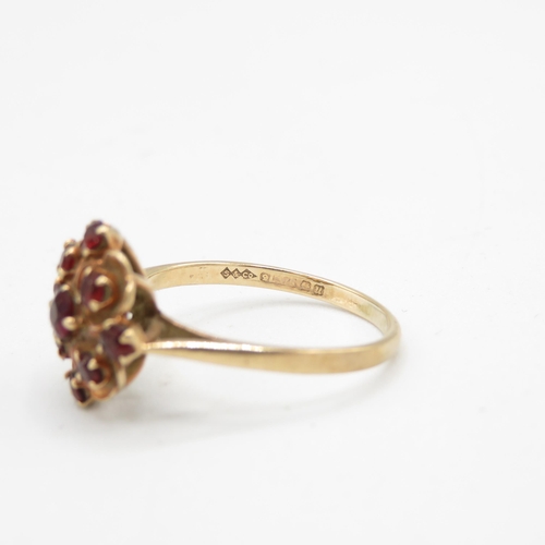 134 - 9ct gold garnet floral cluster ring (2.2g) Size  P 1/2