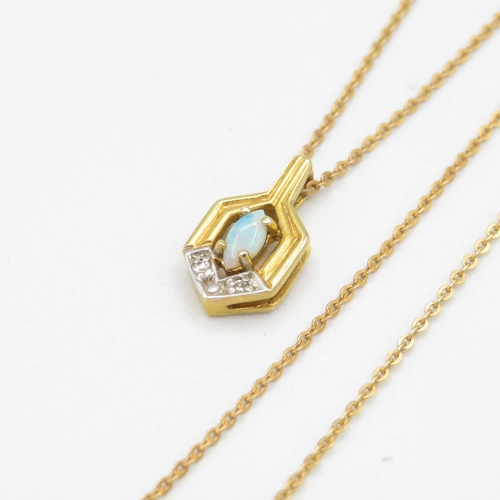 138 - 9ct gold diamond & opal geometric pendant necklace (2.2g)