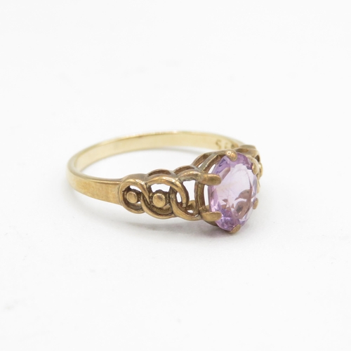 143 - 9ct gold amethyst single stone ring with openwork shank (2g) Size  O