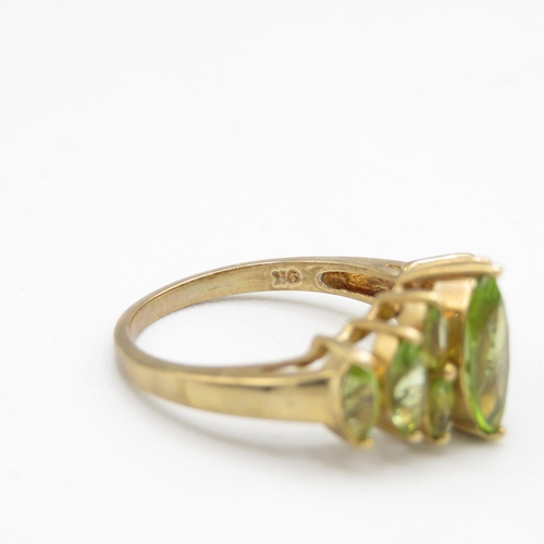 147 - 9ct gold marquise peridot dress ring (3g) Size  M