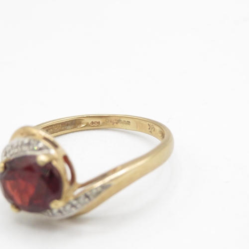 155 - 9ct gold garnet & diamond dress ring (2.5g) Size  R