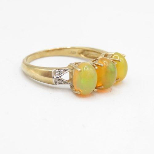 156 - 9ct gold cabochon cut opal & diamond dress ring (2.6g) Size  O