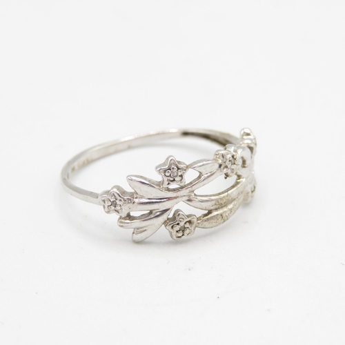 163 - 9ct white gold diamond openwork floral ring (1.7g) AS SEEN - MISHAPEN Size  P 1/2