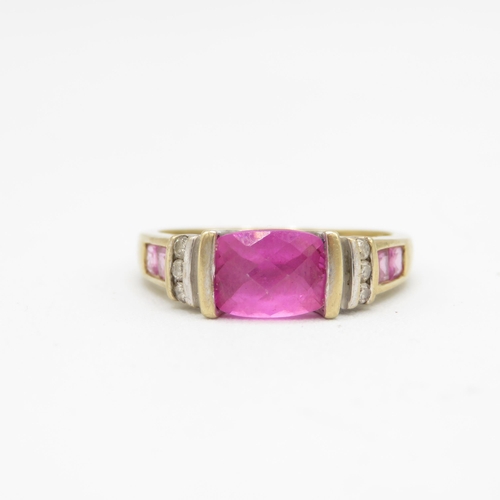 173 - 9ct gold diamond & pink gemstone dress ring (3.3g) Size  P