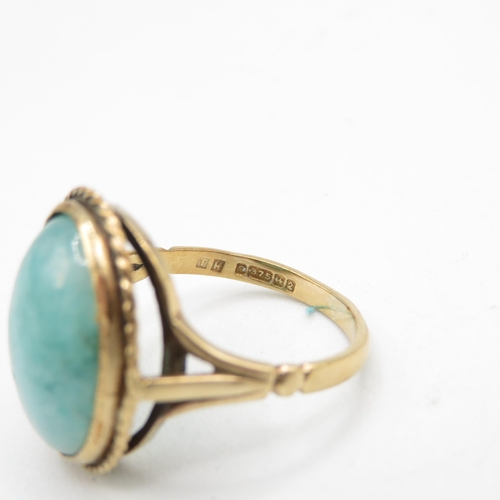 175 - 9ct gold oval cabochon jade dress ring (4.2g) Size  O