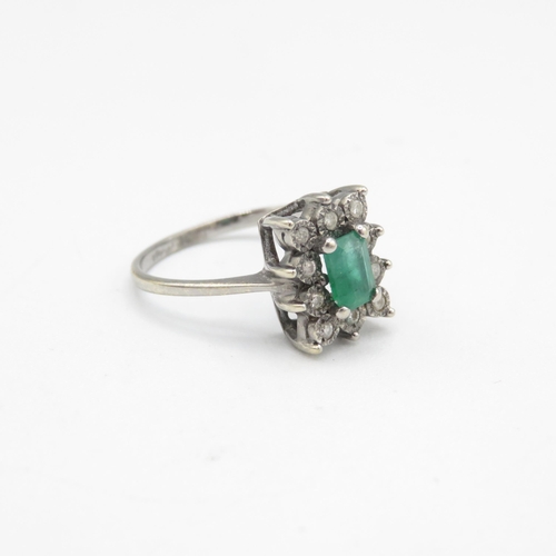 166 - 9ct white gold diamond & emerald cluster ring (2.7g) Size  N 1/2