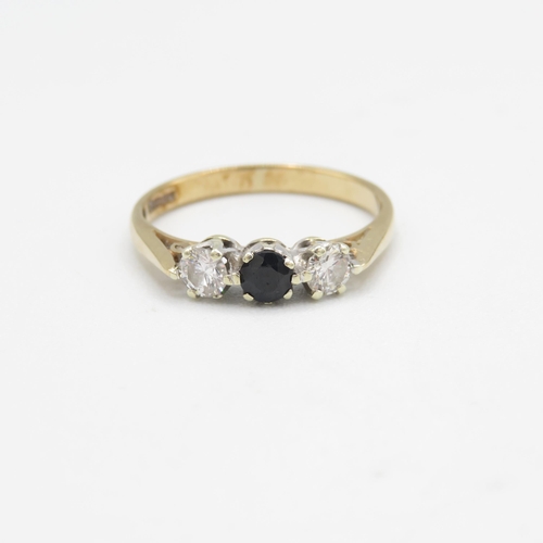 179 - 9ct gold diamond & sapphire three stone ring (1.8g) Size  M