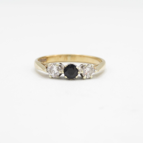 179 - 9ct gold diamond & sapphire three stone ring (1.8g) Size  M