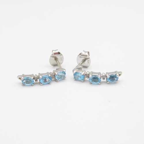 199 - 9ct gold blue topaz & diamond drop earrings (1.8g)