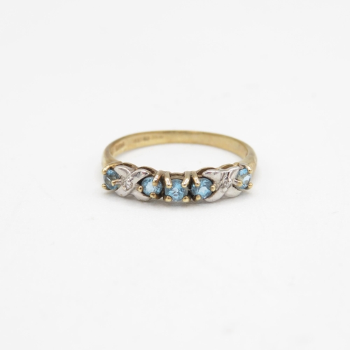 207 - 9ct gold blue topaz & diamond half eternity ring (1.2g) Size  K