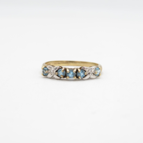 207 - 9ct gold blue topaz & diamond half eternity ring (1.2g) Size  K