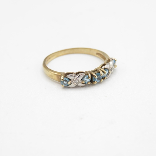 207 - 9ct gold blue topaz & diamond half eternity ring (1.2g) Size  K