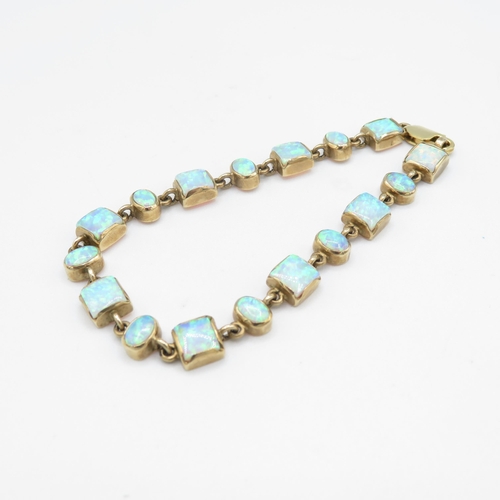 215 - 9ct gold vari-cut synthetic opal bracelet (11.6g)