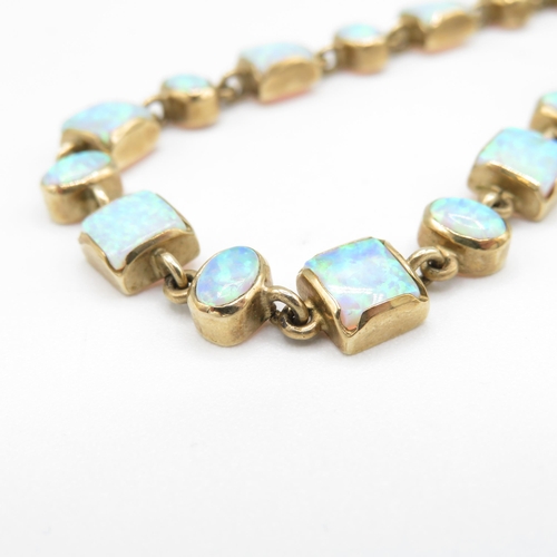 215 - 9ct gold vari-cut synthetic opal bracelet (11.6g)