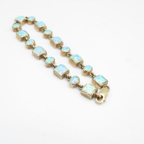 215 - 9ct gold vari-cut synthetic opal bracelet (11.6g)