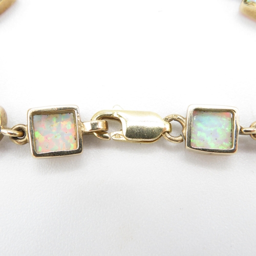 215 - 9ct gold vari-cut synthetic opal bracelet (11.6g)