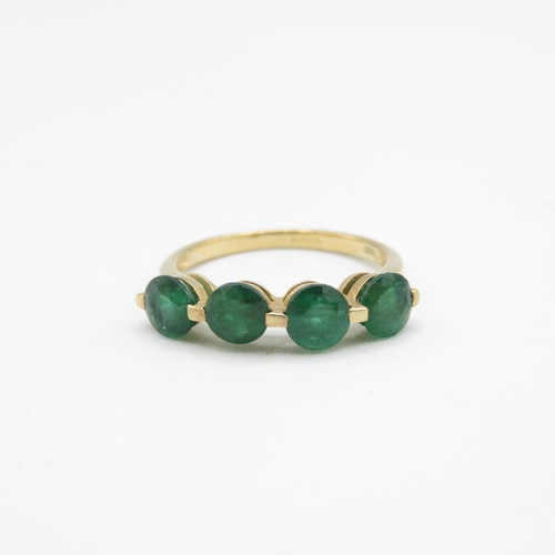 231 - 9ct gold emerald four stone ring (1.9g) Size  O