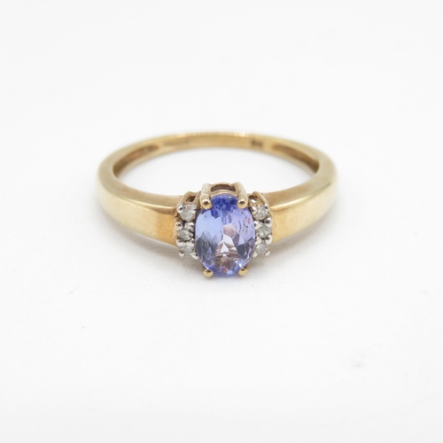 236 - 9ct gold oval cut tanzanite & diamond dress ring (2.1g) Size  P