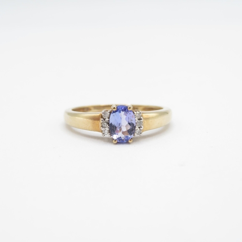 236 - 9ct gold oval cut tanzanite & diamond dress ring (2.1g) Size  P