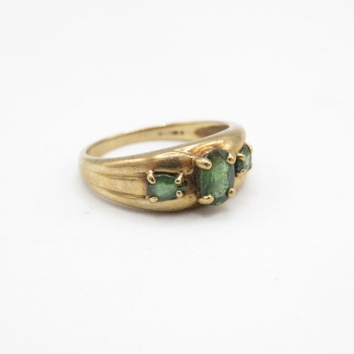 276 - 9ct gold green sapphire three stone ring (2.7g) Size  L  1/2