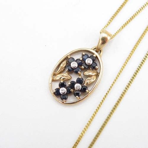 283 - 9ct gold vintage sapphire & diamond floral pendant necklace (3.3g)