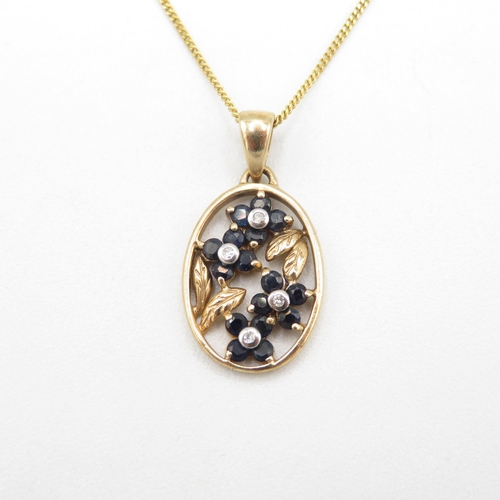 283 - 9ct gold vintage sapphire & diamond floral pendant necklace (3.3g)