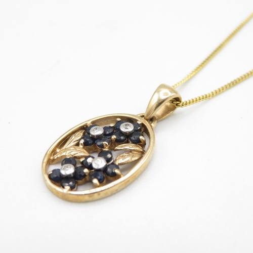 283 - 9ct gold vintage sapphire & diamond floral pendant necklace (3.3g)