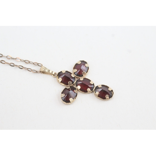 115 - 9ct gold garnet cross pendant necklace (2.2g)