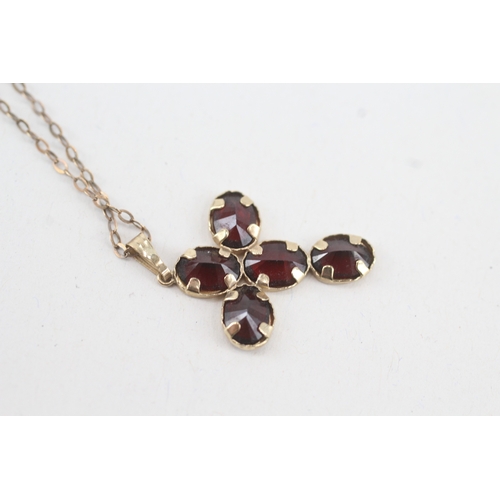 115 - 9ct gold garnet cross pendant necklace (2.2g)