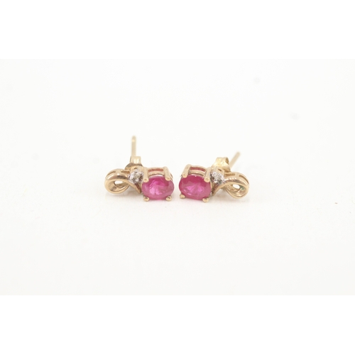 119 - 9ct gold diamond and ruby set stud earrings (1.1g)