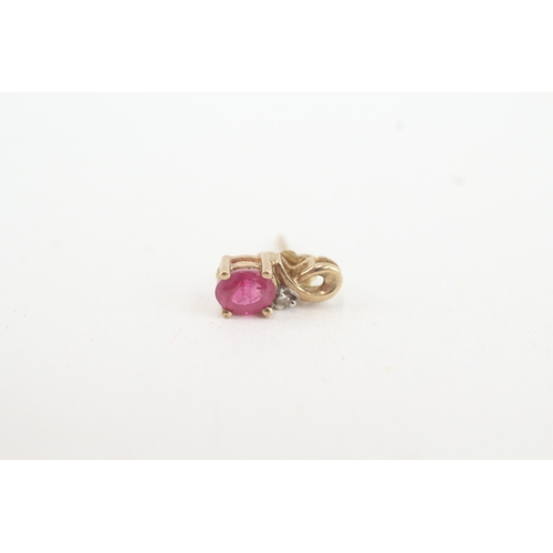 119 - 9ct gold diamond and ruby set stud earrings (1.1g)