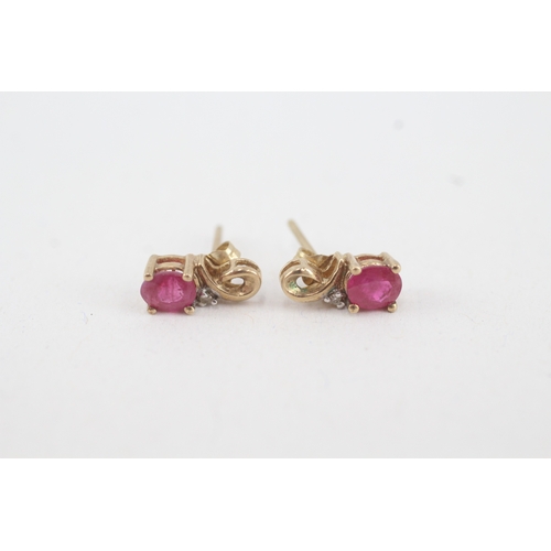 119 - 9ct gold diamond and ruby set stud earrings (1.1g)